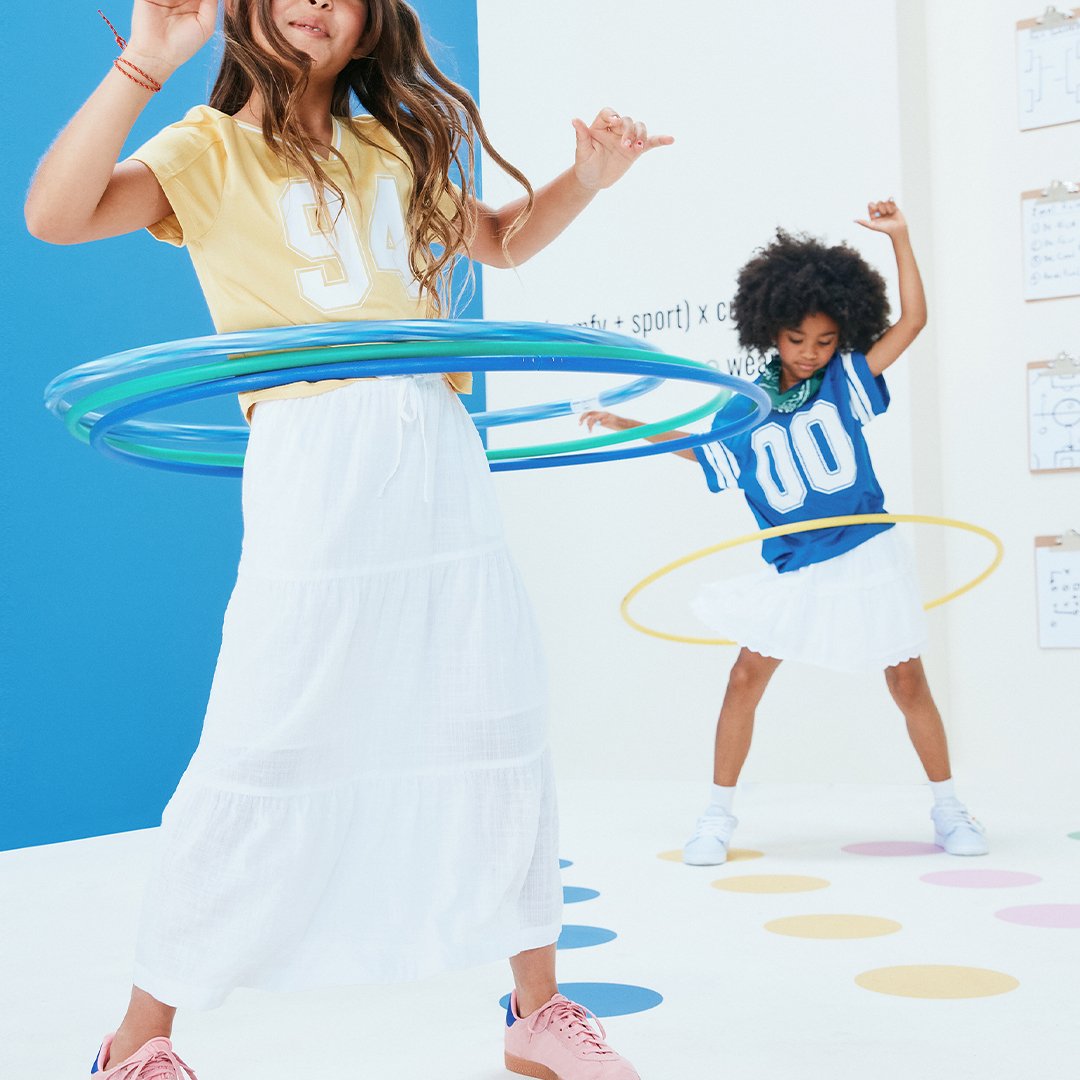Old Navy two girls playing with hula hoops